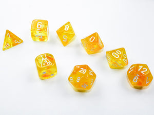Borealis Luminary Canary polyhedral set, showing off brilliant sparkly yellow dice.