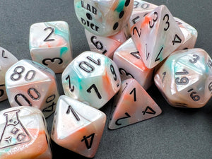 Lustrous Sea Shell polyhedral set, showing more than a full set of dice.