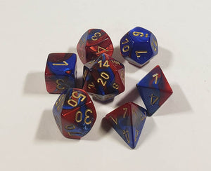 A close up of the Chessex Gemini Blue and Redy polyhedral dice set.