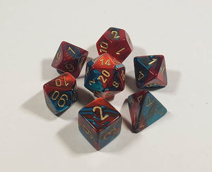 A close up of the Chessex Gemini Red and Teal polyhedral dice set.