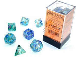 A close up of the Chessex Nebula Oceanic with gold polyhedral dice set.
