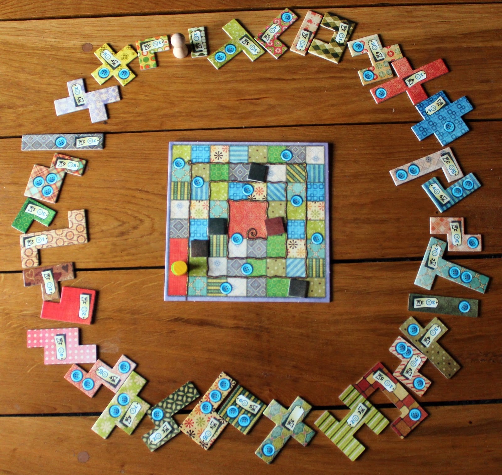 Board game layout with pieces circling the board