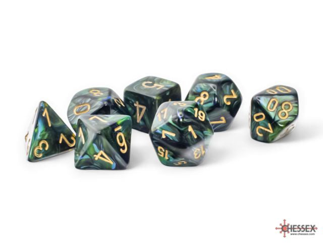 A set of green dice with gold numbers, including various sided dice such as 4, 6, 8, 10, 12, and 20.