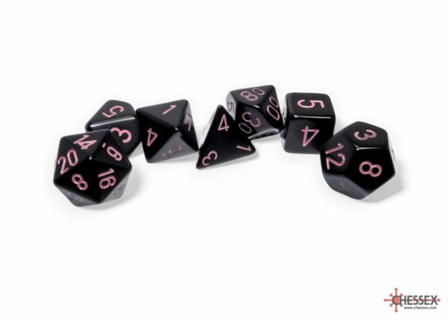 A set of black polyhedral dice with pink numbers, including various shapes such as four-sided, six-sided, eight-sided, ten-sided, twelve-sided, twenty-sided, and percentile dice.
