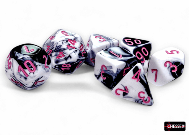 A set of black and white marbled polyhedral dice with pink numbers, including various shapes such as a 4-sided, 6-sided, 8-sided, 10-sided, 12-sided, 20-sided, and 10's digit die.