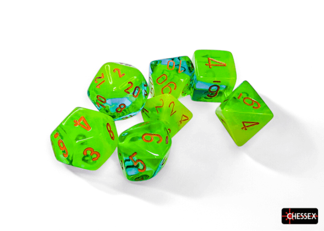 A set of green polyhedral dice with orange numbers and teal accents, manufactured by Chessex.