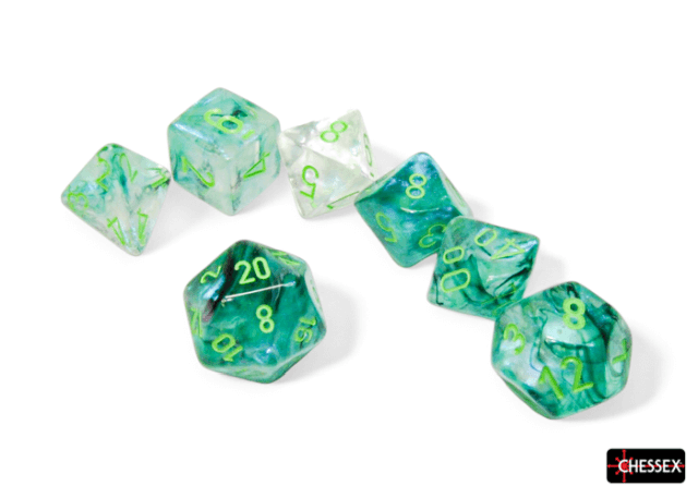 A set of green polyhedral dice with numbers visible, manufactured by Chessex.