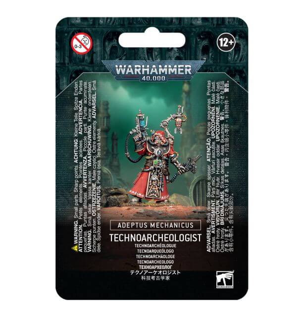 Packaged miniature figure of a Technoarcheologist from the Adeptus Mechanicus, wearing robes and equipped with a pistol, omni-scrambler, and servo-arc claw, displayed on a card with Warhammer 40,000 branding.