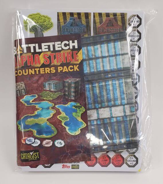 The image shows the BattleTech Alpha Strike Counter Pack, which includes a book and various game pieces, such as cards and punchboards, designed for the BattleTech board game.