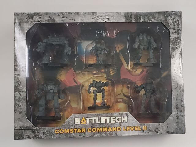A packaged set of BattleTech miniatures displaying six BattleMechs inside the box, labeled as ComStar Command Level II.