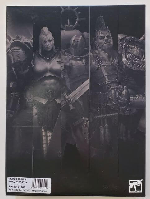 A box set of the Blood Angels Baal Predator miniature, featuring various components such as a twin-linked assault cannon, flamestorm cannon, heavy flamers, heavy bolters, smoke launchers, and Blood Angel icons.