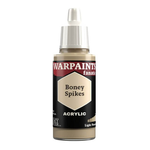 A bottle of Warpaints Fanatic craft paint in the shade Boney Spikes, which is a pale yellowing brown color.