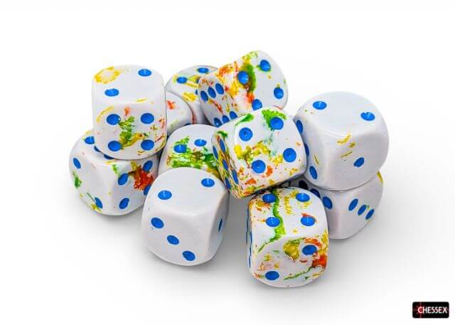 Colorful dice with blue dots on a white background, featuring the Chessex brand.