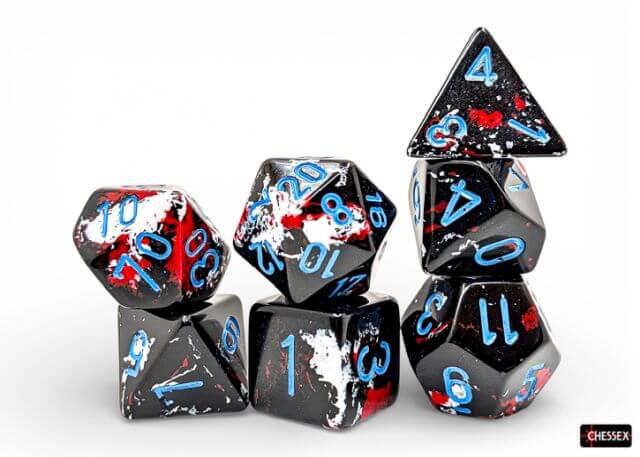 Set of polyhedral dice with black, red, and blue design on a white background