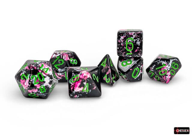 Set of dice with pink and green patterns on a white background