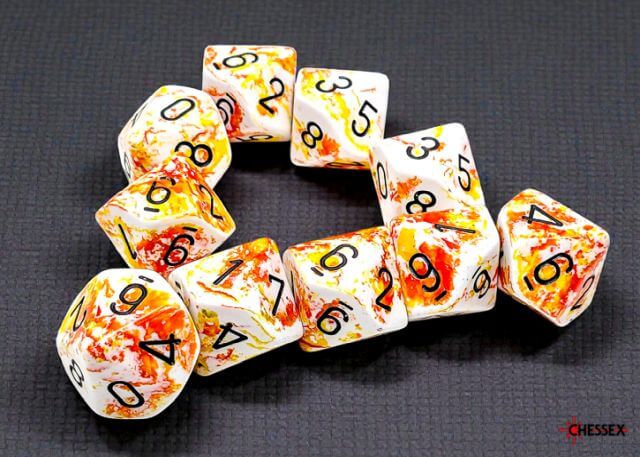 Set of dice with orange and white speckled pattern on a dark background