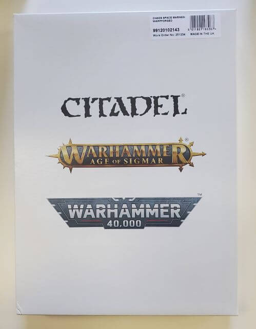 Packaging for 'Citadel Warhammer 40,000: Chaos Space Marines Venomcrawler and Obliterators' miniatures set, displaying the product name and the Warhammer 40,000 logo.