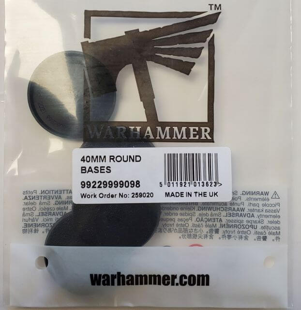 Packaging of Citadel 40mm Round Bases with one base visible through the clear plastic, labeled with the Warhammer brand.