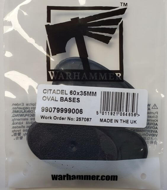 Pack of five Citadel 60x35mm Oval Bases for model painting, displayed in plastic packaging with the Warhammer brand visible.