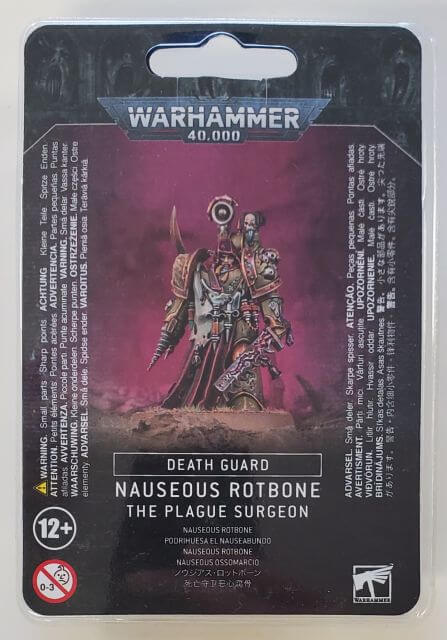 Packaging for Warhammer 40,000 Death Guard Plague Surgeon miniature, featuring the assembled and painted model on the front.