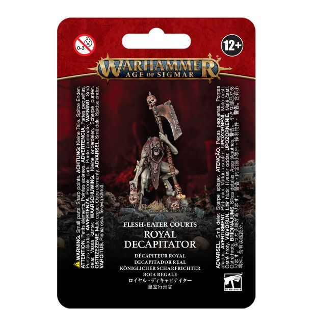 Packaging for the 'Flesh-Eater Courts Royal Decapitator' miniature, featuring the product's description and the image of a Ghoul with a large axe.