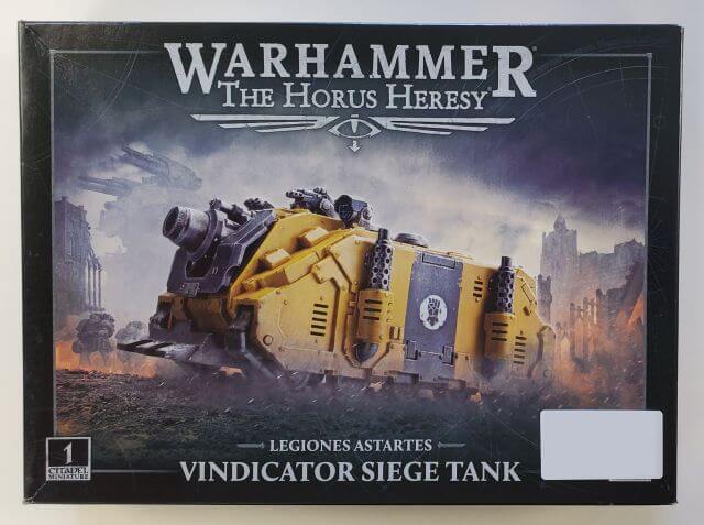Product image of Warhammer The Horus Heresy Legiones Astartes Vindicator Siege Tank miniature, showing the assembled and painted model of the tank with heavy armor and multiple weapon systems.