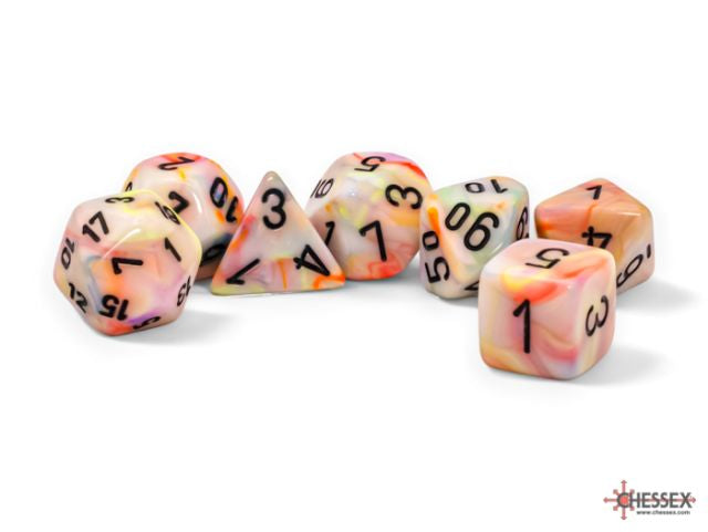 A set of colorful dice with numbers ranging from 0 to 9, indicating various sidedness, placed on a white background.