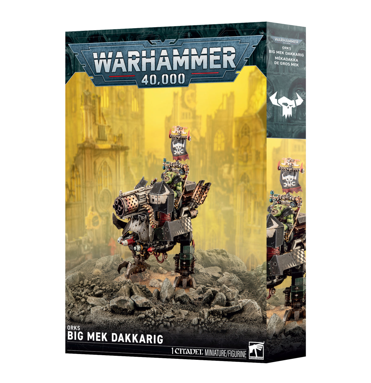 Warhammer 40,000 Big Mek Dakkarig miniature figure box by Citadel Miniatures, showing the illustrated product packaging with a sci-fi city background and the assembled figure on rocky terrain.