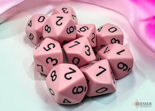 A close of the Chessex pastel pink with black 10 d10 dice set.
