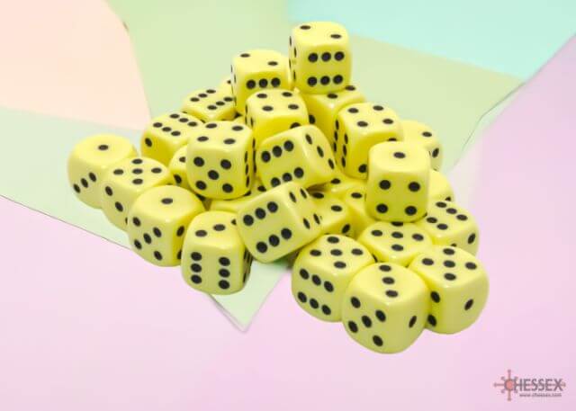 A close of the Chessex pastel yellow with black 12mm d6 dice set.