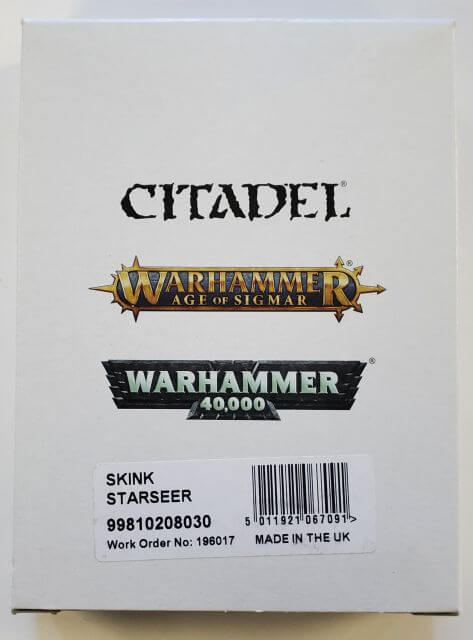 Product packaging for a Seraphon Skink Starseer miniature from Citadel's Warhammer Age of Sigmar line, featuring the box with the model's name and the brand's logo.
