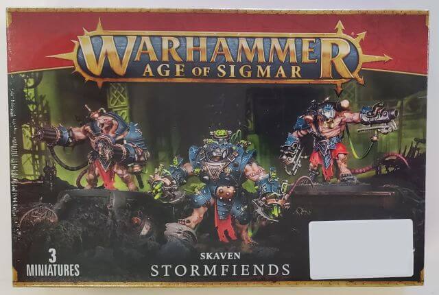 Packaging for Warhammer Age of Sigmar Skaven Stormfiends miniatures, showing the box art with illustrations of the characters and the name of the product.