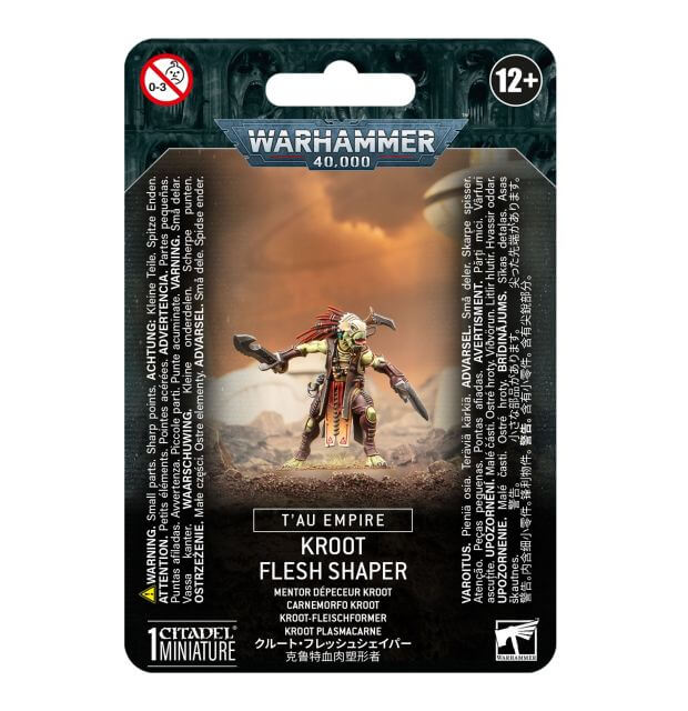 Packaging for Warhammer 40,000 Tau Empire Kroot Flesh Shaper miniature, featuring the assembled and painted model on a card with game-related collection information.