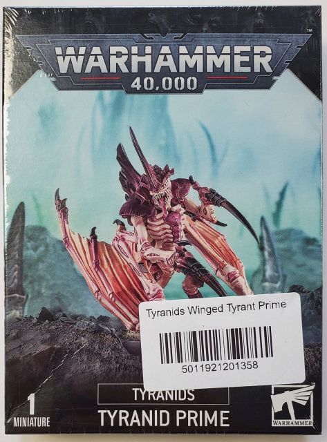 Packaging for Warhammer 40,000 Tyranids Winged Tyrant Prime miniature, featuring the assembled and painted model on the front.
