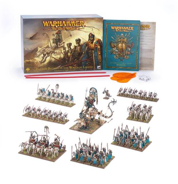 Packaging and contents for Warhammer The Old World starter set featuring Kingdom of Bretonnia and Tomb Kings models and tools to play the game.