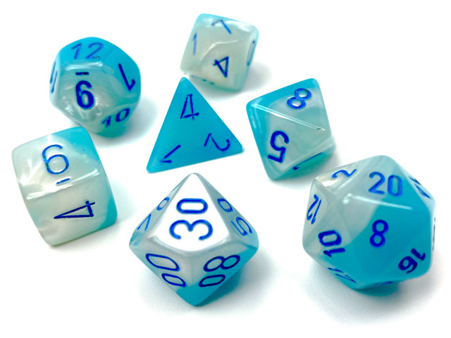 Close up of the Gemini Pearl Turquoise-White with blue polyhedral dice set on a white background. 