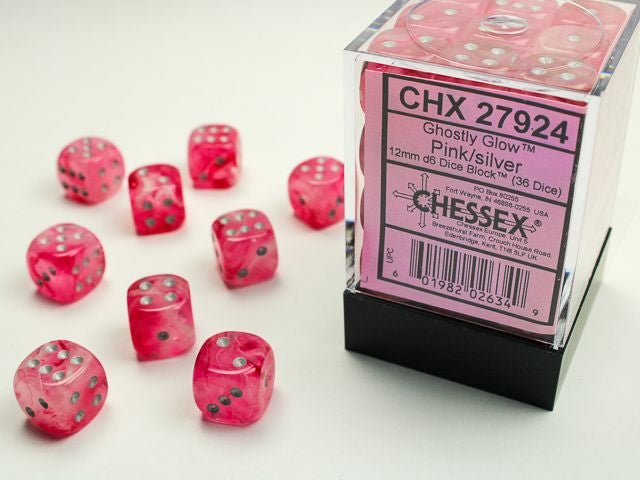A close up of the Chessex Ghostly Glow Pink with Silver 12mm d6 dice along  with its' packaging.