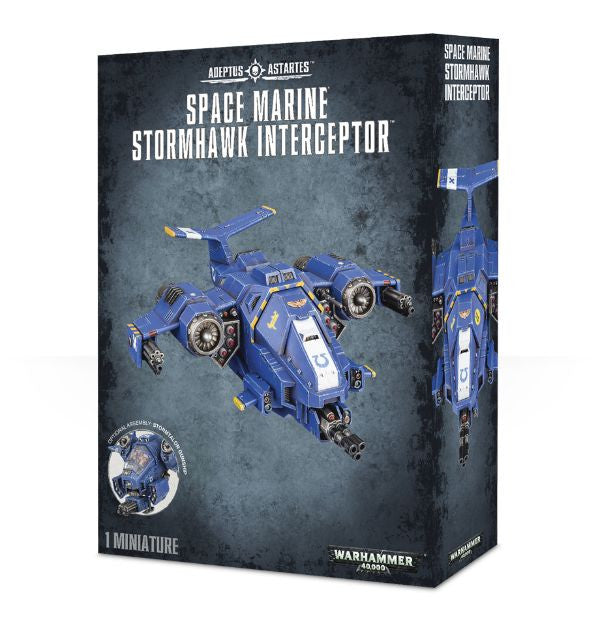 Packaging for Games Workshop's Warhammer 40,000 Space Marine Stormhawk Interceptor model kit featuring the assembled and painted product.