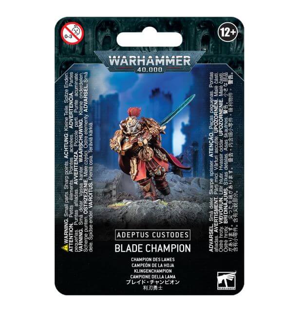 Packaging for Adeptus Custodes Blade Champion miniature in Warhammer 40,000, featuring the assembled and painted model on the front.