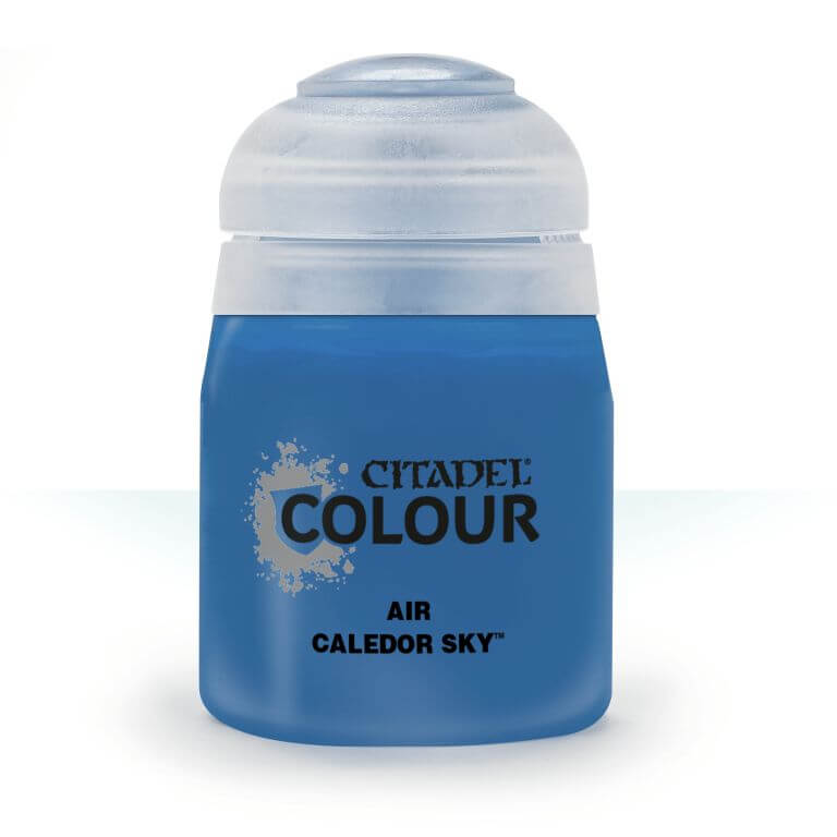 A pot of Citadel Air Caledor Sky paint, primarily blue in color with a white lid and silver accents on the label.