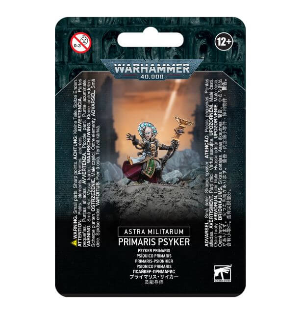 Packaging for Astra Militarum Primaris Psyker miniature, featuring the assembled and painted model on a card with game-related text and symbols.