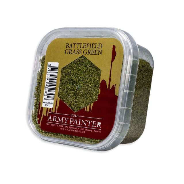 A clear plastic container of Battlefield Grass Green miniature base grass by The Army Painter.