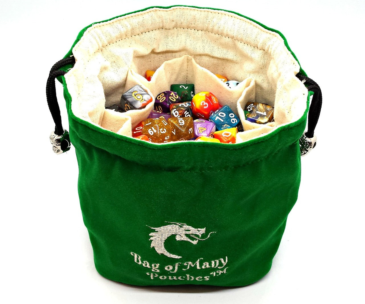 A green dice bag with multiple compartments, made of microfiber, with silver skull toggles and embroidered text 'Bag of Many Pouches'. The bag is filled with various colorful dice.