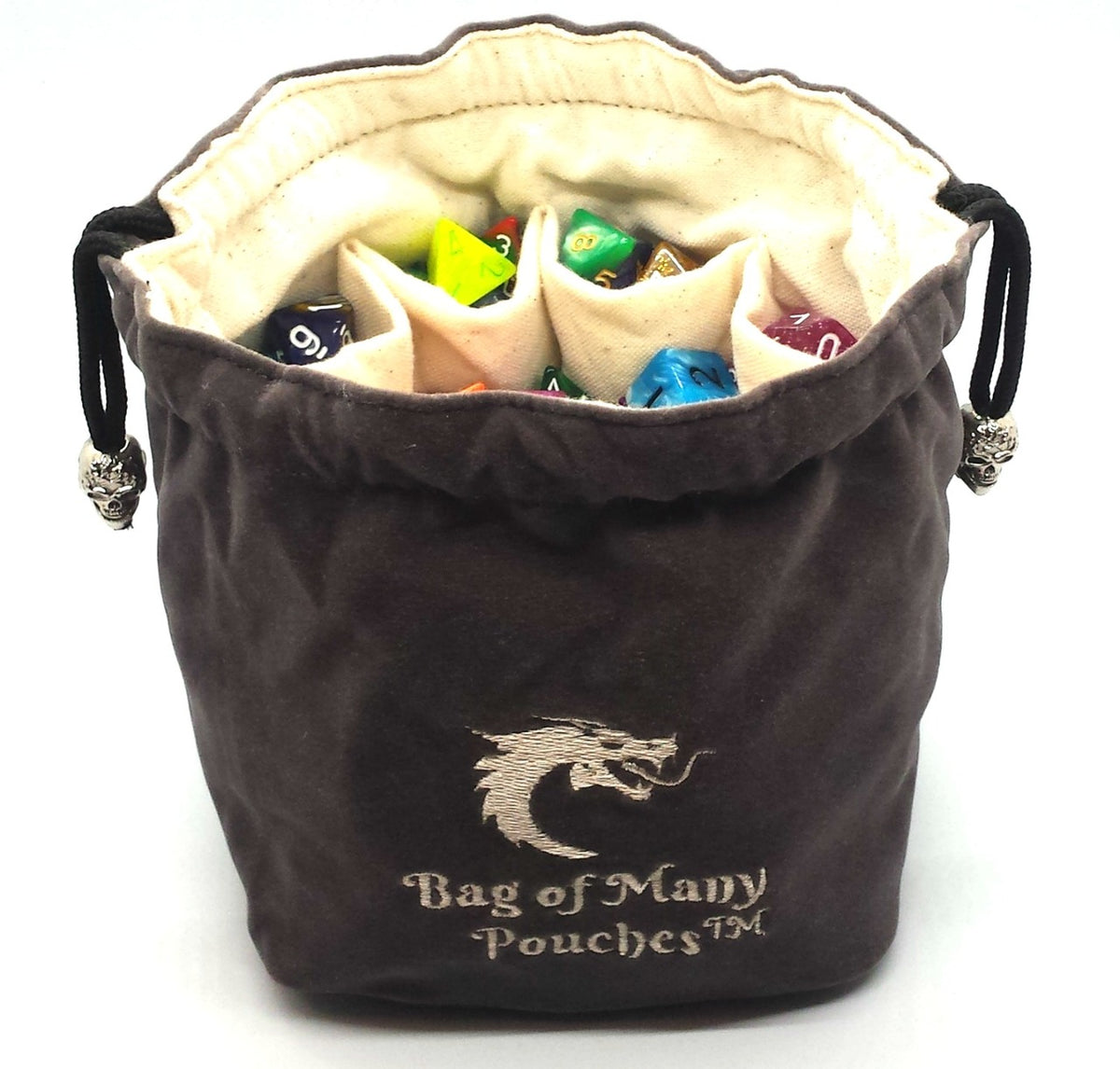 A gray dice bag with multiple compartments, embroidered with a dragon head and the text 'Bag of Many Pouches'. The bag is shown filled with various colorful dice.