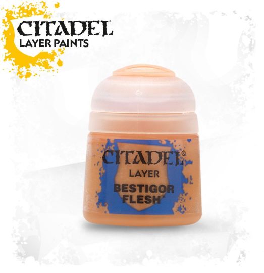 A pot of Citadel Layer paints in the color 'Bestigor Flesh' designed for painting miniatures.