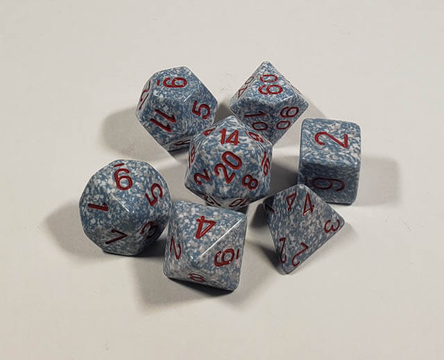 A close up of the Chessex specked air polyhedral dice set.