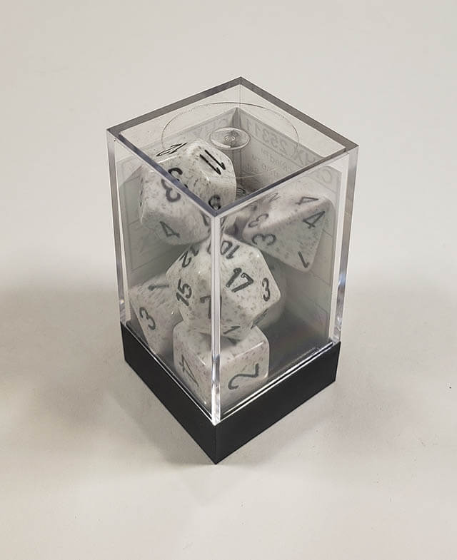 A close up of the Chessex specked Arctic Camo polyhedral dice set in its package.