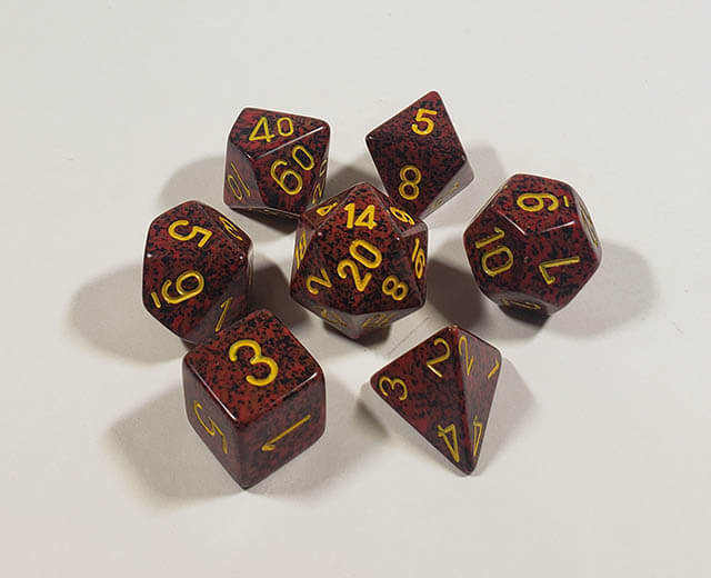 A close up of the Chessex specked Mercury polyhedral dice set.