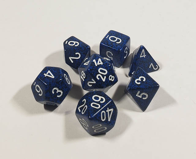 A close up of the Chessex specked Stealth polyhedral dice set.