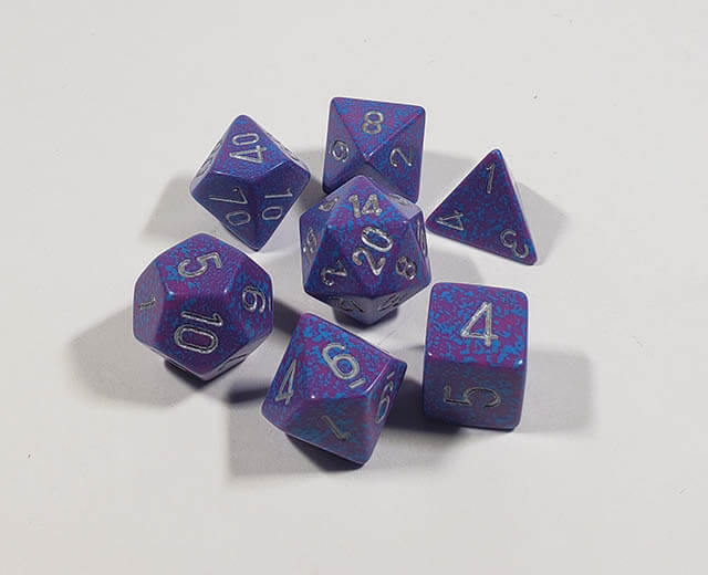 A close up of the Chessex specked Silver Tetra polyhedral dice set.